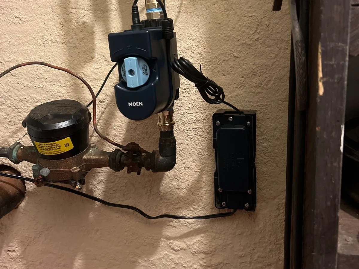 Moen Flo shutoff installed on a copper main water line, just past the water meter, in a customer's basement