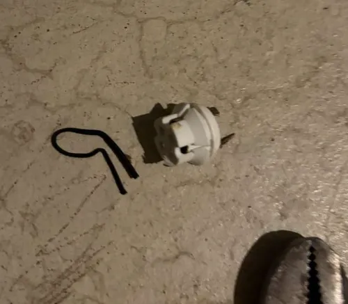 Failed Rheem flammable vapor sensor and its retaining clip after removal from a power vented water heater in Wadsworth
